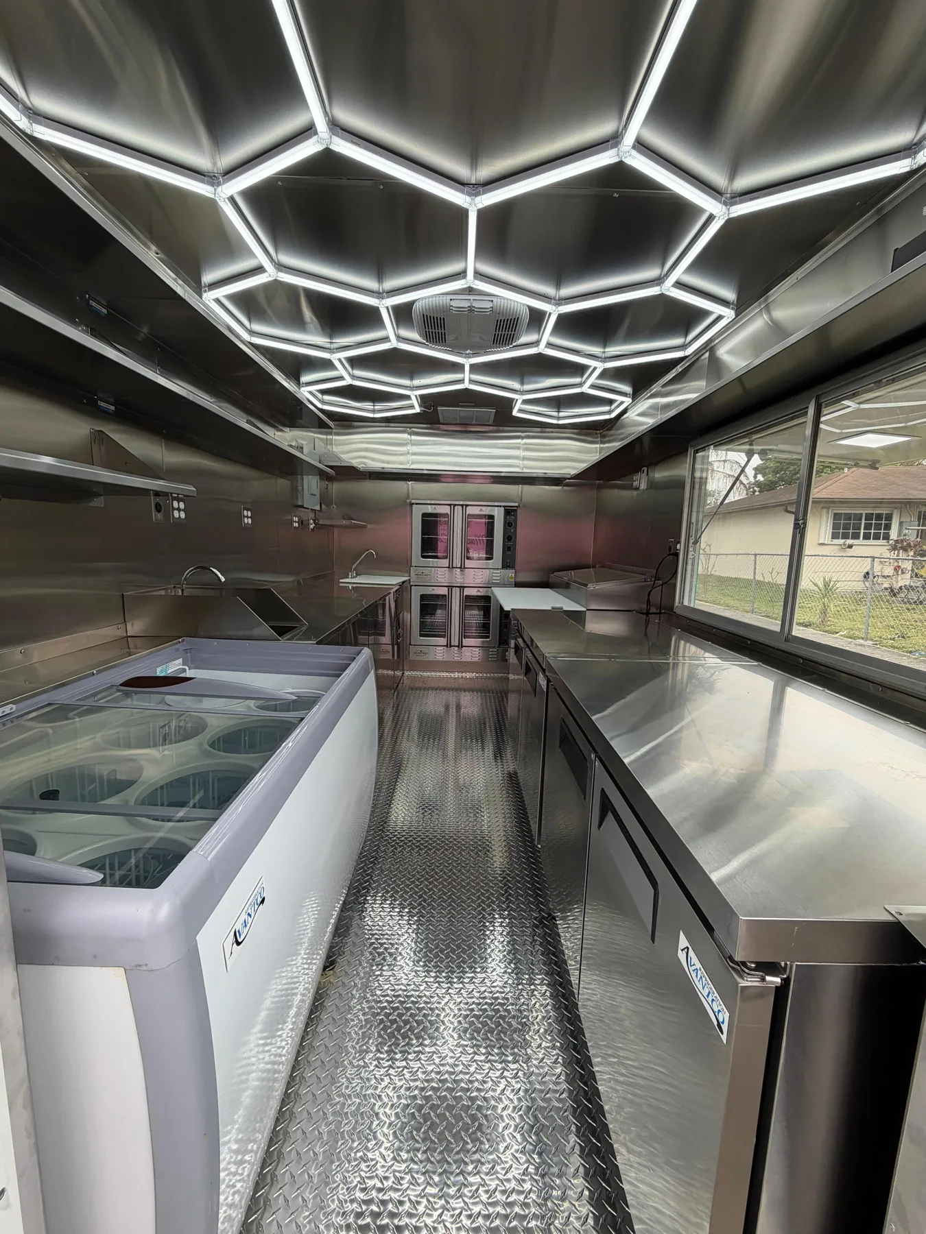 Inside the Miami Pizza food truck showing the clean prep area